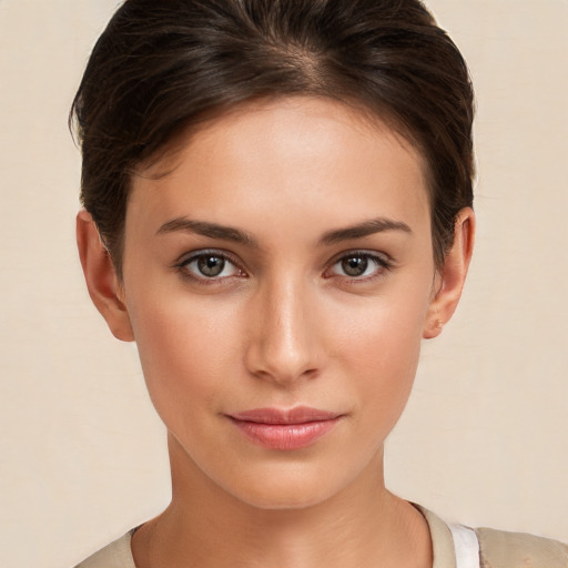 Neutral white young-adult female with short  brown hair and brown eyes