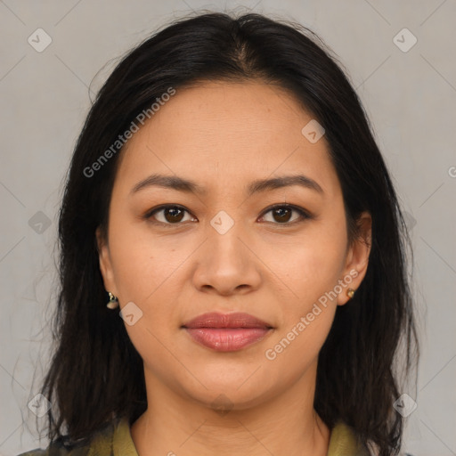 Joyful latino young-adult female with medium  brown hair and brown eyes