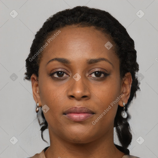 Neutral black young-adult female with medium  brown hair and brown eyes