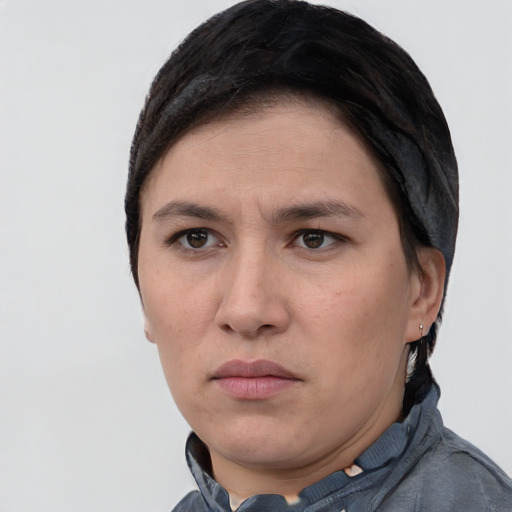 Neutral white young-adult female with short  black hair and brown eyes
