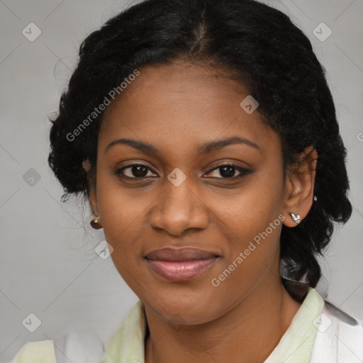 Joyful black young-adult female with medium  black hair and brown eyes