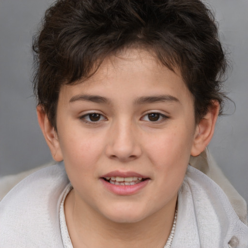 Joyful white child female with short  brown hair and brown eyes