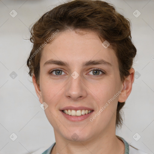 Joyful white young-adult female with medium  brown hair and green eyes