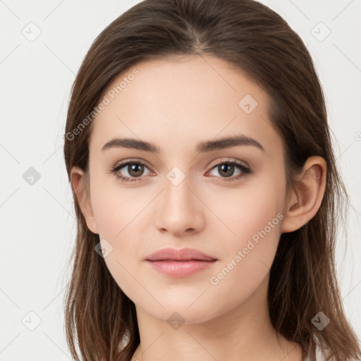 Neutral white young-adult female with long  brown hair and brown eyes