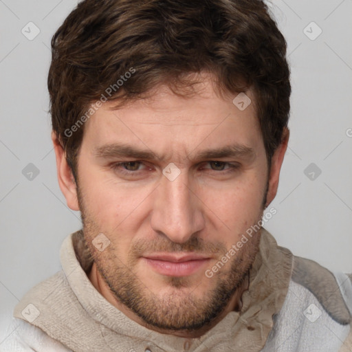 Joyful white adult male with short  brown hair and grey eyes