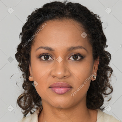 Joyful black young-adult female with long  brown hair and brown eyes