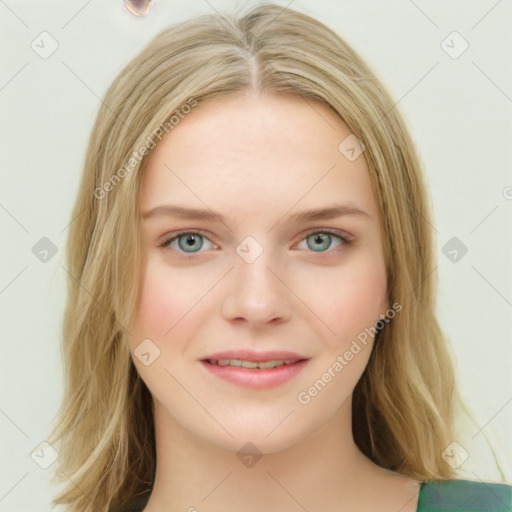 Joyful white young-adult female with long  brown hair and green eyes