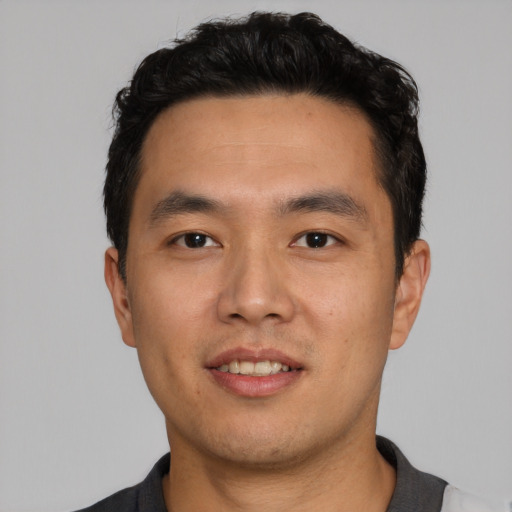 Neutral asian young-adult male with short  black hair and brown eyes