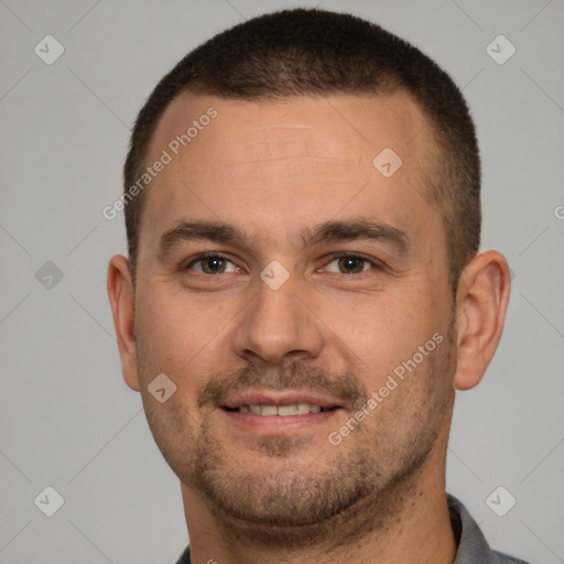 Joyful white young-adult male with short  brown hair and brown eyes