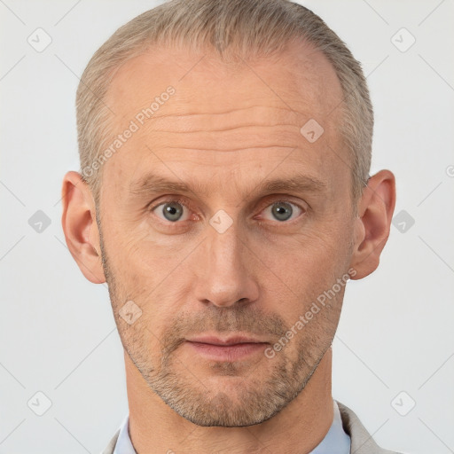 Neutral white adult male with short  brown hair and brown eyes