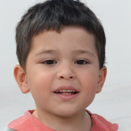 Joyful white child male with short  brown hair and brown eyes