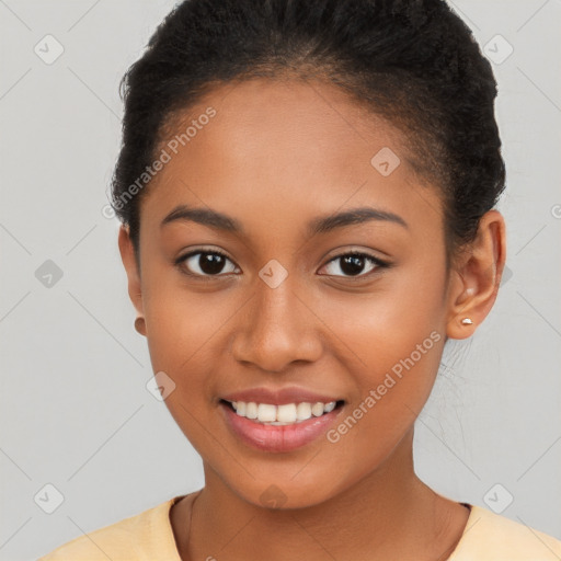 Joyful latino young-adult female with short  brown hair and brown eyes