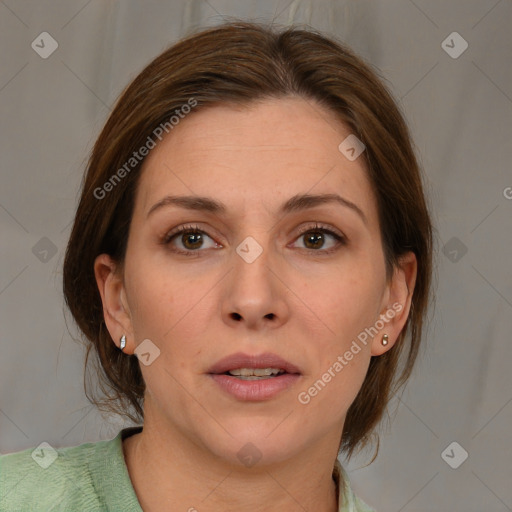 Joyful white adult female with medium  brown hair and brown eyes