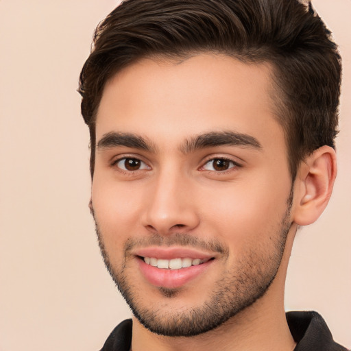 Joyful white young-adult male with short  brown hair and brown eyes