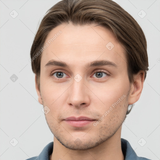 Neutral white young-adult male with short  brown hair and grey eyes