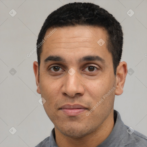 Neutral latino adult male with short  black hair and brown eyes