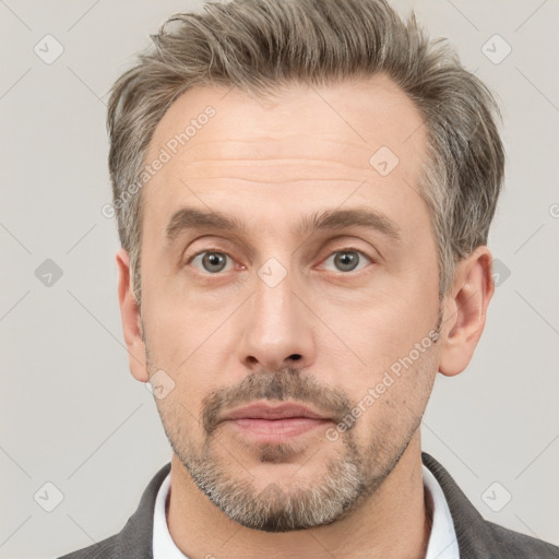 Neutral white adult male with short  brown hair and brown eyes