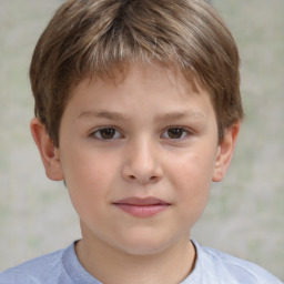 Joyful white child male with short  brown hair and brown eyes