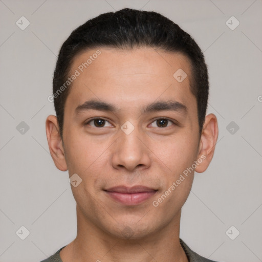 Joyful white young-adult male with short  black hair and brown eyes