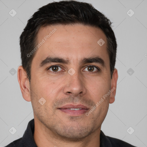 Joyful white adult male with short  brown hair and brown eyes