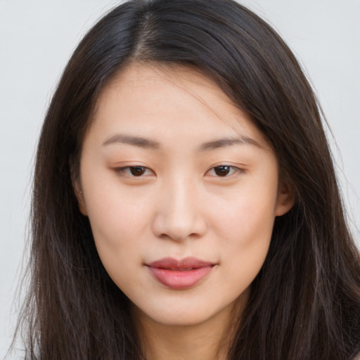Neutral asian young-adult female with long  brown hair and brown eyes