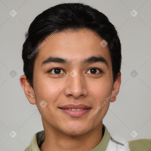 Joyful asian young-adult male with short  brown hair and brown eyes