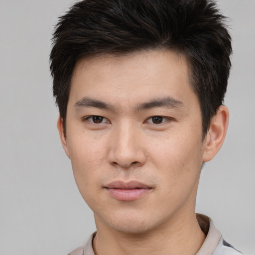 Neutral asian young-adult male with short  brown hair and brown eyes
