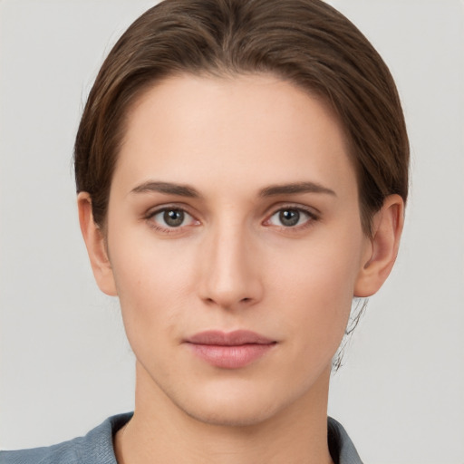 Neutral white young-adult female with short  brown hair and brown eyes