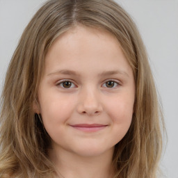 Joyful white child female with medium  brown hair and brown eyes