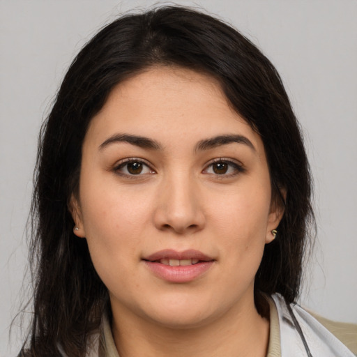 Joyful white young-adult female with medium  brown hair and brown eyes