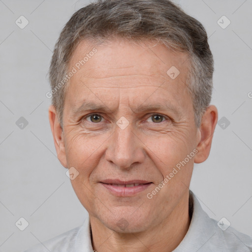 Joyful white middle-aged male with short  brown hair and brown eyes