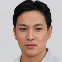 Neutral asian adult male with short  black hair and brown eyes