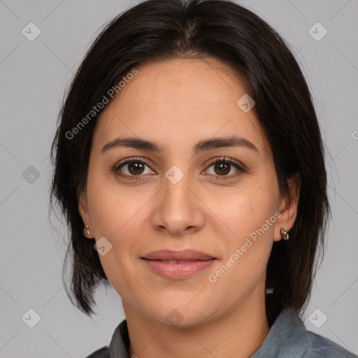 Joyful white adult female with medium  brown hair and brown eyes