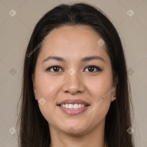 Joyful latino young-adult female with long  brown hair and brown eyes