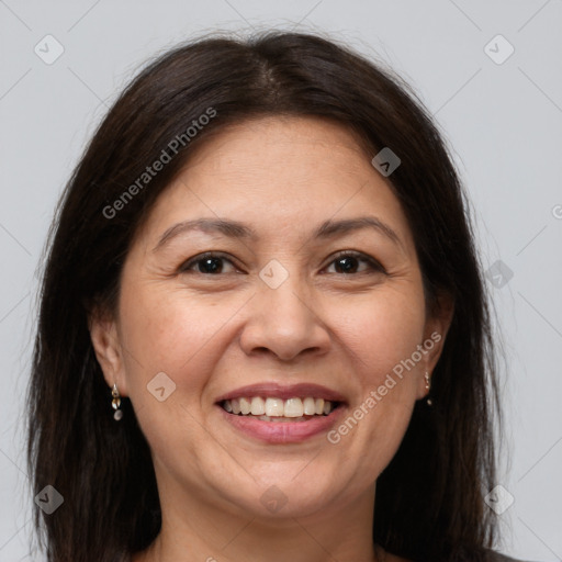 Joyful white adult female with medium  brown hair and brown eyes