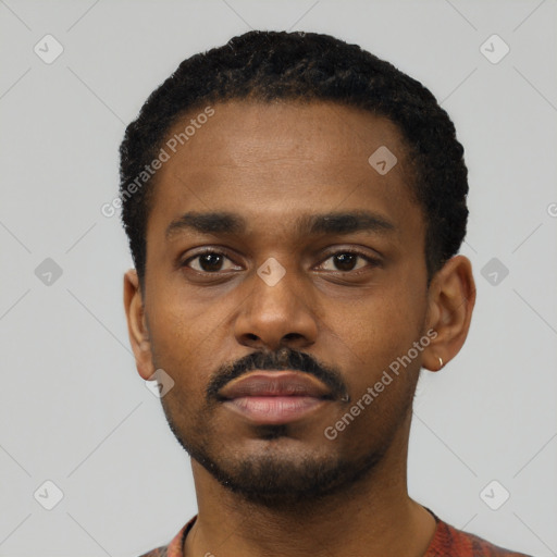 Neutral black young-adult male with short  black hair and brown eyes