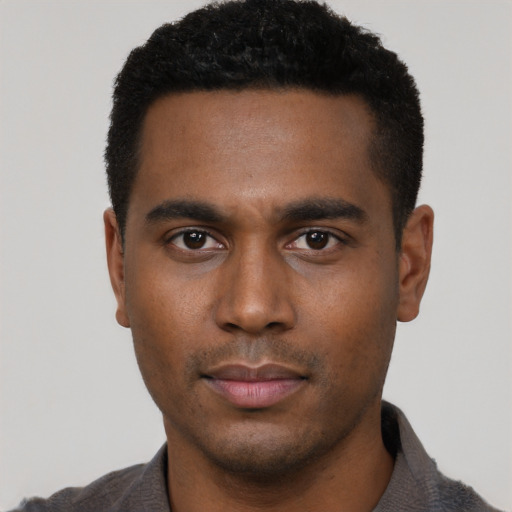 Neutral black young-adult male with short  black hair and brown eyes