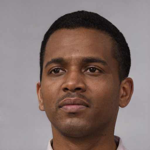 Neutral black young-adult male with short  black hair and brown eyes