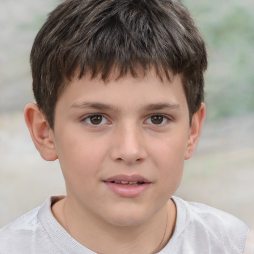 Joyful white child male with short  brown hair and brown eyes