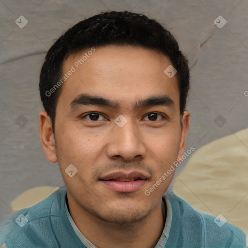 Joyful white young-adult male with short  black hair and brown eyes