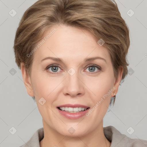 Joyful white adult female with short  brown hair and grey eyes