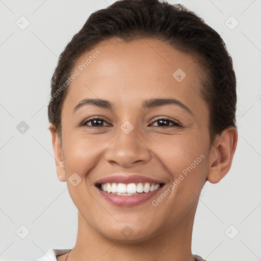 Joyful white young-adult female with short  brown hair and brown eyes