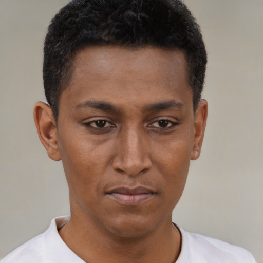 Neutral black young-adult male with short  black hair and brown eyes