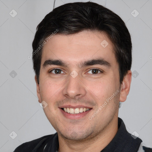 Joyful white young-adult male with short  brown hair and brown eyes