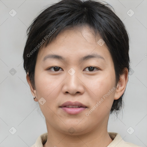 Joyful asian young-adult female with short  brown hair and brown eyes