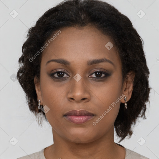 Neutral black young-adult female with medium  brown hair and brown eyes