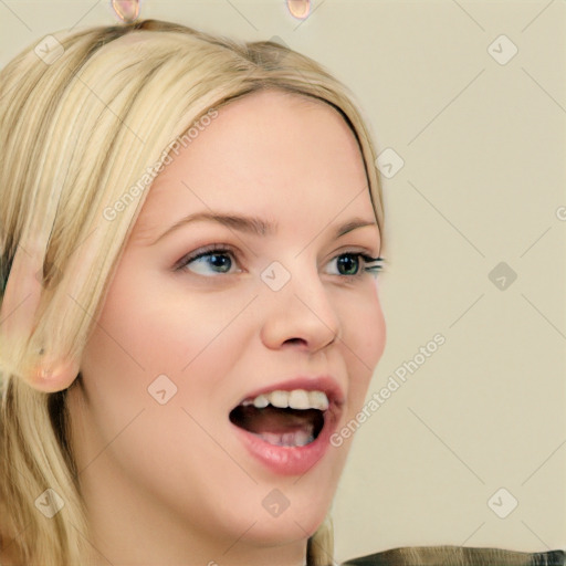 Joyful white young-adult female with long  brown hair and blue eyes