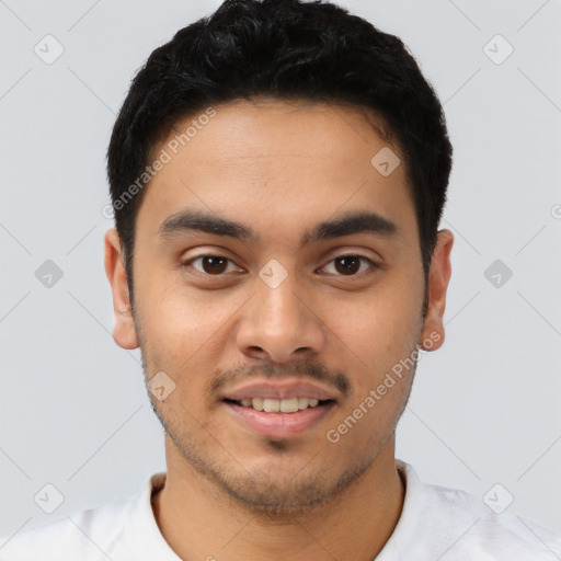 Joyful latino young-adult male with short  black hair and brown eyes