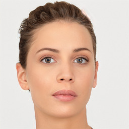 Neutral white young-adult female with short  brown hair and brown eyes