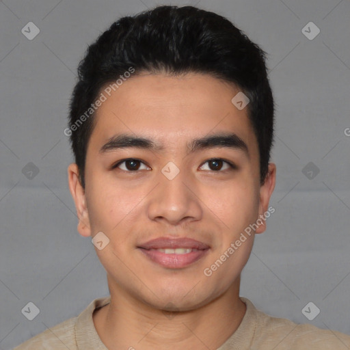 Joyful asian young-adult male with short  black hair and brown eyes